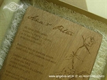 wooden greeting card with the engraved text