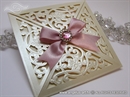 laser cut wedding invitation with decorative brooch