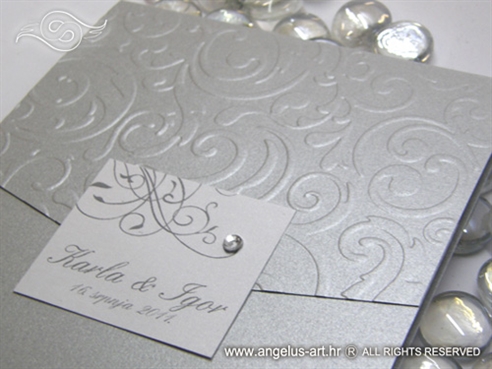 silver wedding invitation with embossing pattern